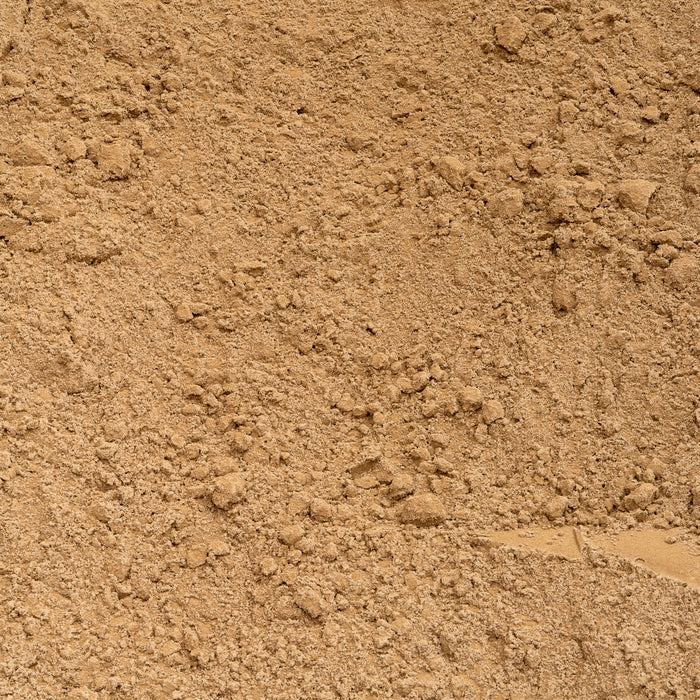 Premium 90/10 Top Dress close-up showing the fine screened sandy texture